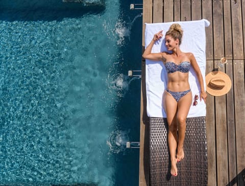 Indoor pool, outdoor pool, pool umbrellas, sun loungers