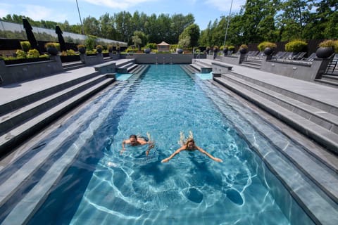 Indoor pool, outdoor pool, pool umbrellas, sun loungers