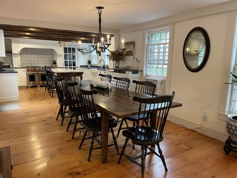 Dining Room with seating for 8. Additional table with chairs available. 
