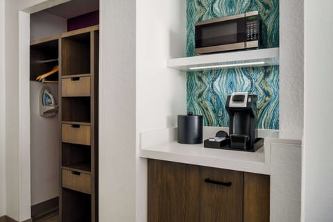 Desk, blackout drapes, iron/ironing board, free cribs/infant beds