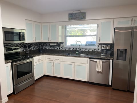 Large kitchen with new appliances and everything needed 