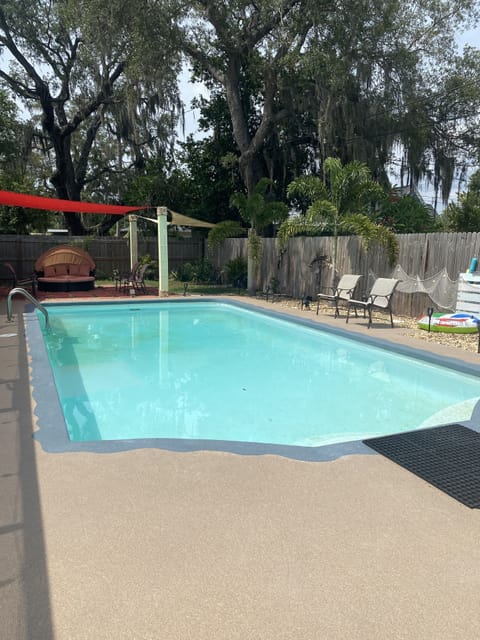 Large pool with tons of seating areas for enjoying some fun in the sun