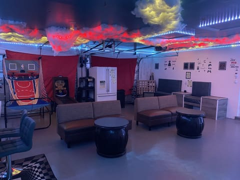 Game room with lighting controlled by Alexa.