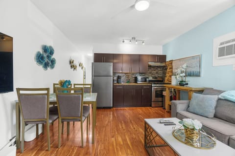 Standard Apartment, 1 Queen Bed with Sofa bed, Non Smoking (Suite Nine) | Living area | 65-inch flat-screen TV with satellite channels, TV