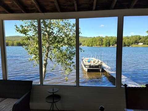 A view of the dock and the lake. Pontoon boat shown for effect, not included.