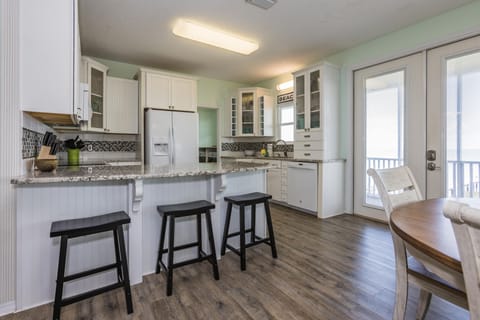 Dining and Kitchen area overlooks the Bay