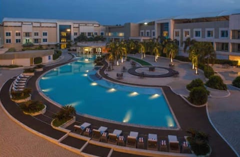 Outdoor pool, pool umbrellas, sun loungers