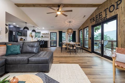 Enjoy plentiful natural light and stunning views of the slopes from kitchen, dining, and living.