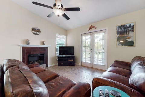 The luxe furnishings enhance this home's warm and inviting ambiance.