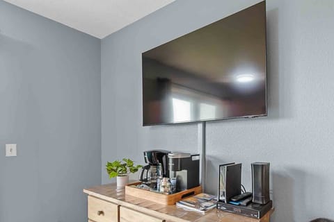 A 55 inch Smart TV with Spectrum Cable.