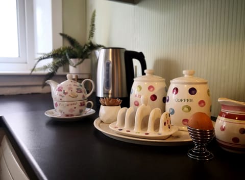 Welcome tray of tea, coffee, milk and biscuits is provided