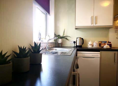 Fully equipped Kitchen with views to rear of property