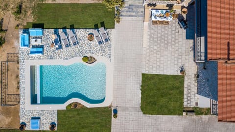 private swimming pool surrounded by spacious outdoor areas - 