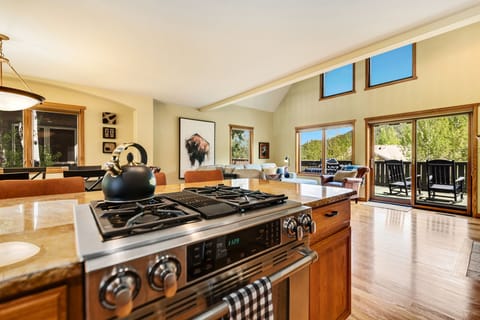 The kitchen is well-equipped with stainless steel appliance and all essentials for family meals