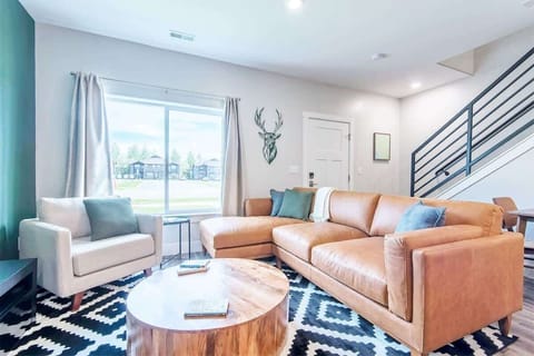 Living room with open views and new furnishings.