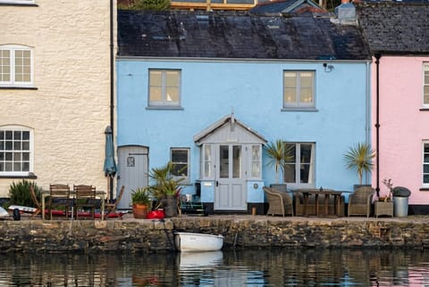 Blue waterfront cottage facing the estuary, your home on the water`s edge