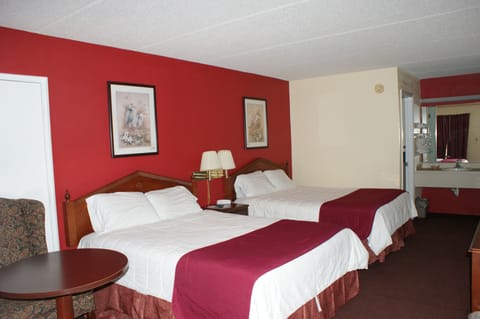 Double Queen Room, Smoking | Iron/ironing board, free WiFi, bed sheets