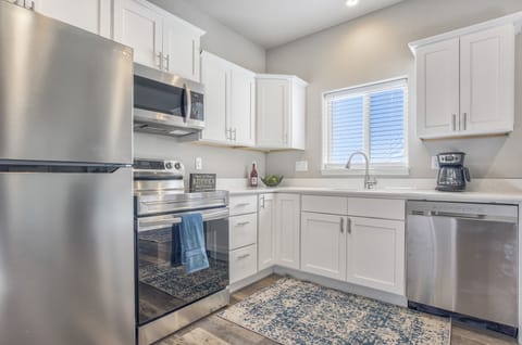 Kitchen with Quartz and Stainless Steel