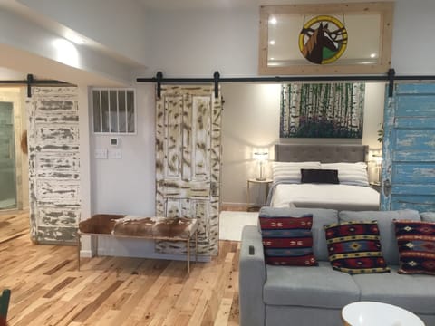 Cozy living area with eclectic artistic touches

