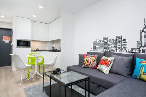 Living room with a comfortable sofa and TV. 