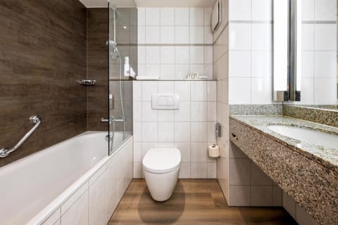 Combined shower/tub, hair dryer, towels, soap