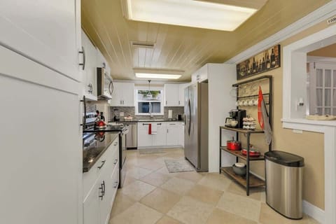 Beautifully clean & spacious kitchen with all new appliances! Stocked with everything you need for your stay & then some! Pots, pans, utensils, plates, bowls, wine glasses, coffee mugs, cups, blender, toaster, Keurig Duo k-cup & coffee maker & more!