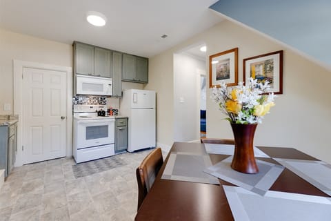 Eat-in kitchen includes comfortable seating for three.