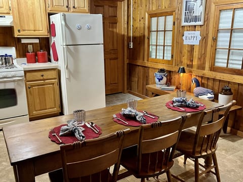 Eating area and kitchen, plus sky lights make this a cozy gathering area..