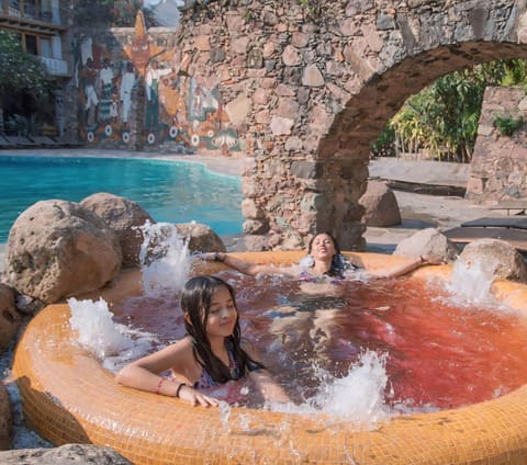 2 outdoor pools, open 9 AM to 7 PM, pool umbrellas, sun loungers