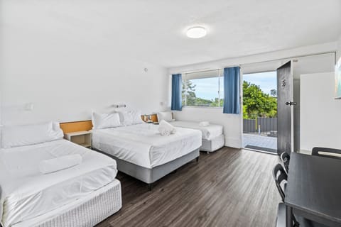 Family Room, Kitchenette | Desk, laptop workspace, iron/ironing board, WiFi (free)