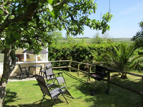Enjoy the sunny private top garden with BBQ, loungers and patio furniture.