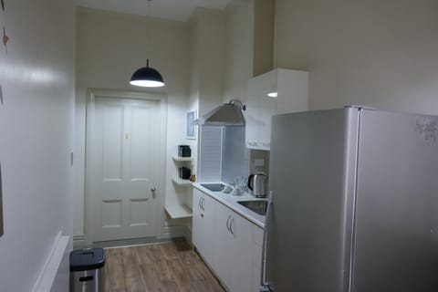 Apartment, 3 Bedrooms | Private kitchen | Fridge, coffee/tea maker, electric kettle