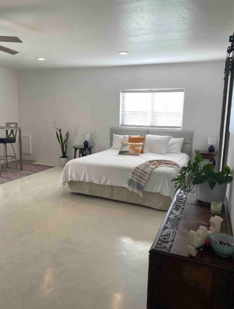 Very comfortable king Tempurpedic bed made up with nice sheets and pillows.