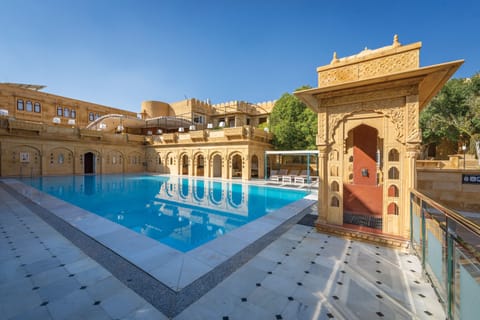 Outdoor pool, pool umbrellas, sun loungers