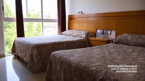 Standard room with 2 beds and air conditioning | Free WiFi, bed sheets