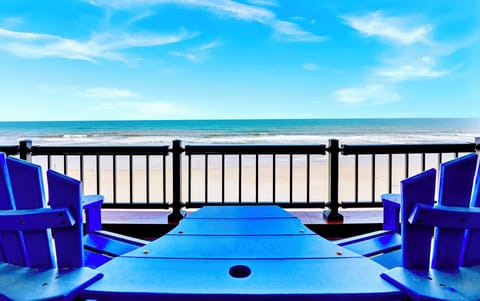 Balcony view with comfortable seating. Direct ocean front.