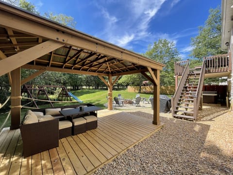 Backyard with Gazebo, Fire Pit, Playground, and Hot Tub