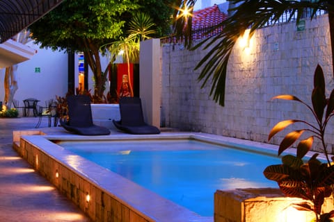 Outdoor pool, open 9 AM to 8:30 PM, sun loungers