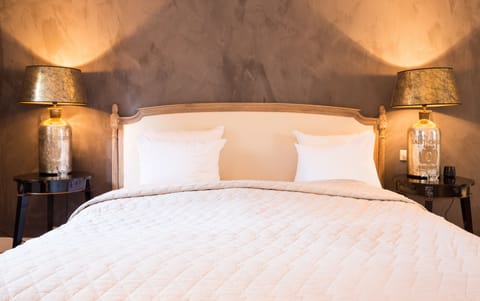 Suite, 1 King Bed | Premium bedding, down comforters, in-room safe, individually decorated