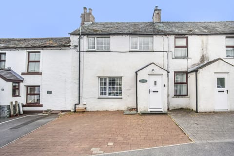 To the front of the property are 2 private parking spaces