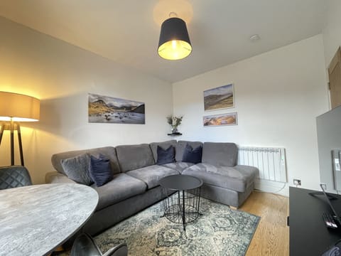 The living and dining area is beautifully decorated - perfect for cosy nights in