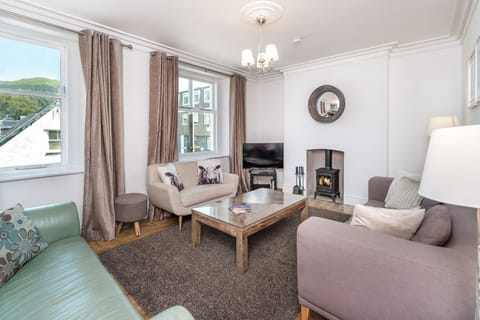 The first floor living room enjoys views towards the fells
