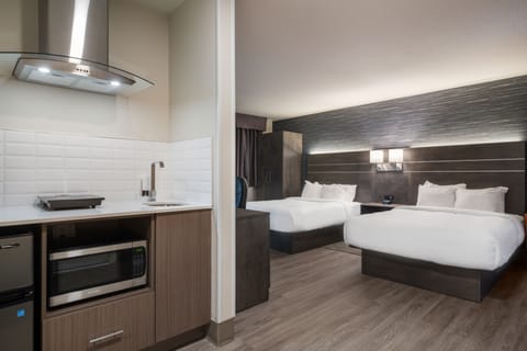 Deluxe Double Room | Premium bedding, desk, laptop workspace, blackout drapes