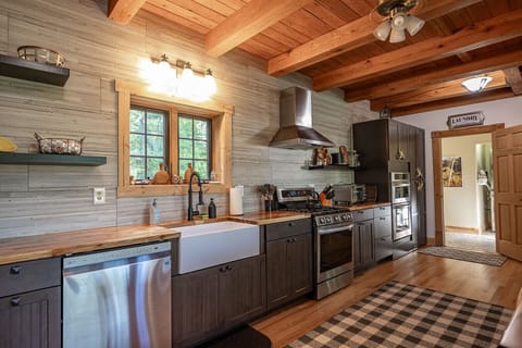 Gourmet Kitchen: Bright space with modern appliances and rustic charm, perfect for culinary adventures!
