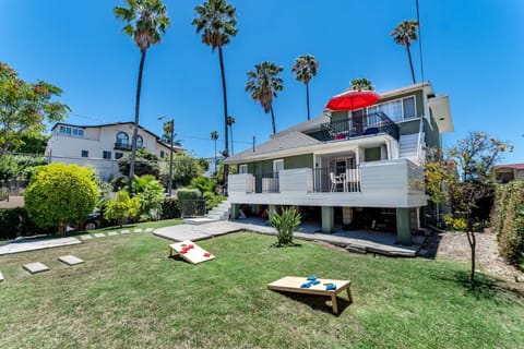 Bring the whole family to our 6 Bedroom 2-level home with large back yard and several patio balcony's. Plus cornhole game set