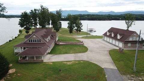 This beautiful lake house awaits you! With your own private boat ramp & dock!