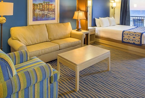 Studio Suite, Ocean View | Living area | 40-inch Smart TV with cable channels, TV, DVD player