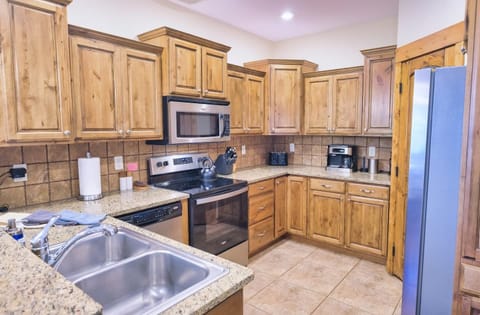 The stainless steel appliances and robust set of cookware makes just about any meal possible in this kitchen.