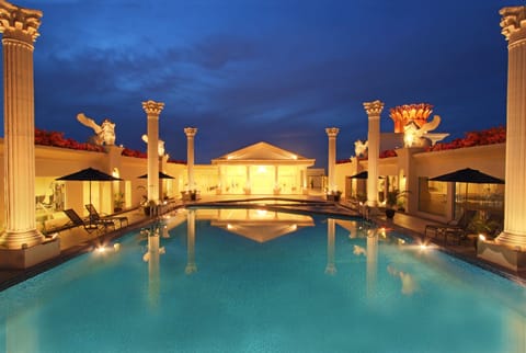 Outdoor pool, pool umbrellas, sun loungers