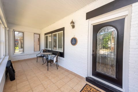 Enjoy your morning beverage on the sunny, enclosed front porch.